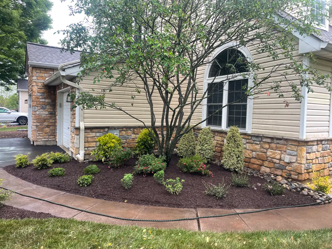 Fresh planted beds and mulch at a building frontage